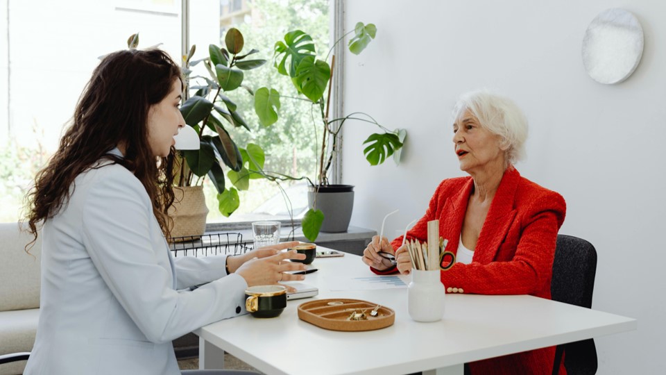 woman executive interviewing a younger woman